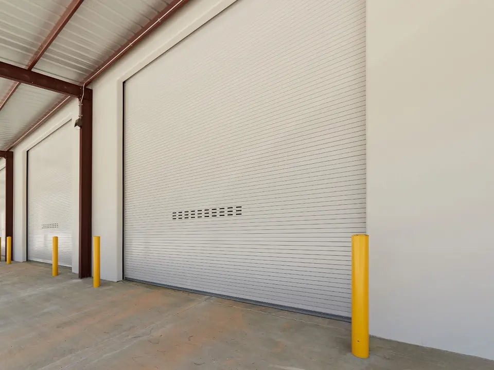 ASTA 400HP Series high-performance rolling steel door on a warehouse exterior